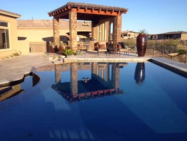 Reverse negative edge Travertine deck, spa, reverse negative edge play pool,