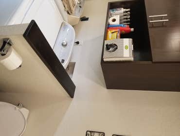 V. Jones Bathroom/Laundry Room Remodel - Tub to Step-in Shower Conversion with Linear Drain
- New Vanity, Toilet, Sink, mirror, toiletries
- All new fl