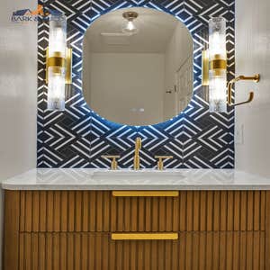 Mountain View, 3 Bathrooms A modern bathroom remodel featuring a custom walk-in shower with green vertical tile, frameless glass enclosure, and...