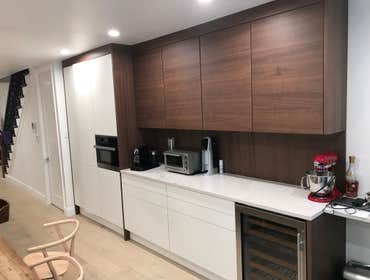 Townhouse Renovation & Addition Full townhouse renovation, including kitchens, bathrooms, basement, and backyard. Replaced all electric, plumbing and H