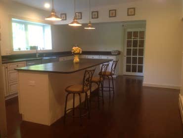 Coastal Ivory Kitchen Cabinet Project We used Coastal Ivory kitchen cabinets for this kitchen make over. The project consisted of a new LG fridge and d