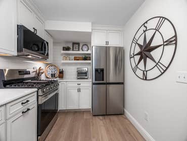 Photos by Evolve Remodeling Inc #1 Complete home remodel (condo). New kitchen, two new bathrooms, new floors, new tile, custom closets, New HVAC, upgra