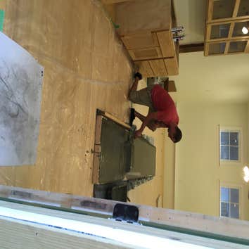 Photos by It's Up to Her, LLC #1 Convert 1800 sq ft of storage space behind commercial location into 2 apartments with 2 bedroom, 2 bath, custom cabine