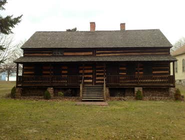 Project photos from Griesemer Construction The exterior of this porch was old deteriorated concrete with a aluminum posts & roof.Now it's trex lumber d