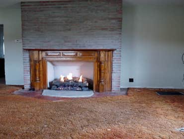 Project photos from Kotar Contracting Making a fake gas fireplace.