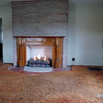 Project photos from Kotar Contracting Making a fake gas fireplace.