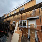 Photos by Santiago's Bay Builders Inc #1 Remodeling half of the building