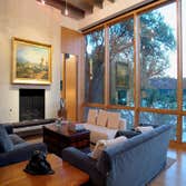 Landa Residence This striking modern structure is constructed of steel, concrete, and glass with warm white oak wood and Texas buff-leuder stone interi