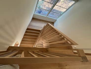 Photos by Cabmat Design Build #3 -Custom White Oak 3 Story Slat Wall with 1 1/2" Radius Hand Rail
-Custom Oak Mounts
-Exposed Post and Beam
-Custom Win