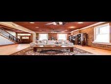 Photos by New Earth LLC #1 Restoration of a 1890's row house. Kitchen is brazilian lacewood and mahogany and the open space concept keeps the exposed b