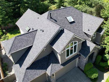 Photos by Brave Roofers LLC #1 This home got a stunning upgrade with CertainTeed Landmark Pro shingles in Max Def Black Walnut—a perfect blend of durab
