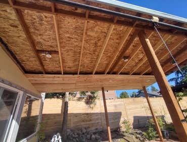 Photos by Stewart & Son Gate & Fence LLC #1 Tiny House with pergola. Small house 17' by 12' small bathroom with pocket door, and small sink with water 