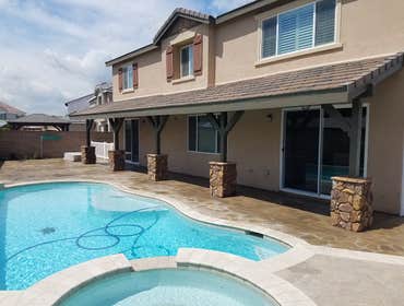 Photos by Neos Construction #11 Patio addition with Stone Columns