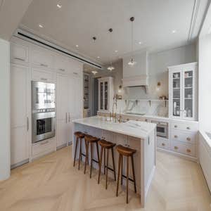 UWS DeVol Installation Installation of DeVol cabinetry in kitchen in multiple other rooms as well as design and installation of wainscoting in...