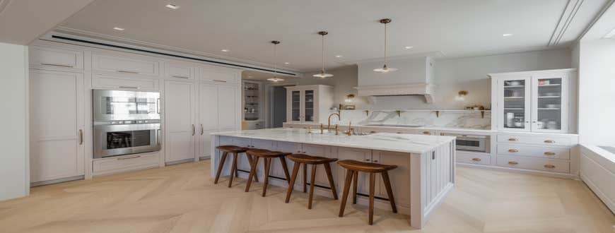 UWS DeVol Installation Installation of DeVol cabinetry in kitchen in multiple other rooms as well as design and installation of wainscoting in vari...