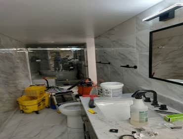 Photos by Dbs Remodeling #2 Cut out floor by to add new plumbing for the shower vanity toilet and tub also cut by out cider block by for door way frame
