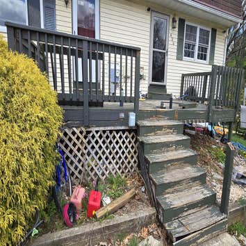 Photos by Smyrna Construction #1 The old, rotten deck was completely removed and replaced with a much more modern deck built with composite materials.