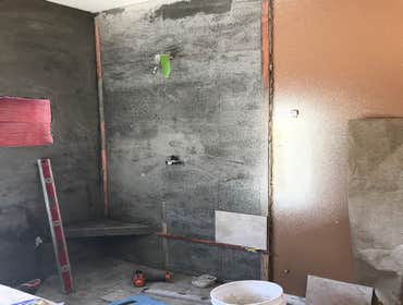 Photos by Griffin Tile & Marble Co #1 Master bath remodel. Remove PVC shower insert , remove separating wall , install new tile shower matching the til