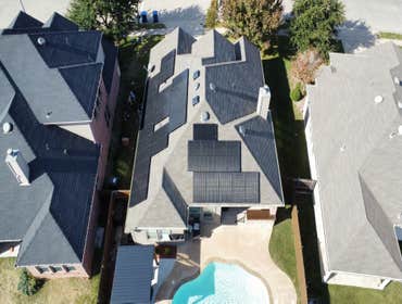 Photos by Texas Solar Panimals, LLC #2 13.6 kW rooftop solar installation with install of 2 solar attic fans - Top tier qCell 400 W panels paired with 