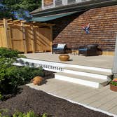 Photos by Wade Construction & Remodeling #4 added a small deck with an outdoor shower to an antique farmhouse