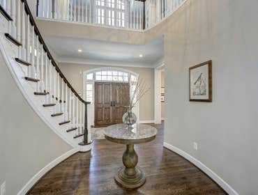GULICK | CUSTOM Home in McLean The impressive stone and HardiePlank® elevation on our Winthrop really stood out on this corner lot of approximately one