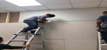 Photos by J Maax Restoration and Remodeling #4 Sheetrock hanging for Verizon