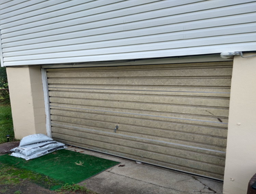 Photos by Duckett Carpentry #13 Customer had a garage door that she wanted replaced with an entry door with side lights. All other installers turned he