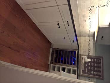 BUTLER'S PANTRY Took a relatively small space behind the kitchen and made it useful with:
-Full upper and lower cabinetry
-Wine frig and rack
-Grani