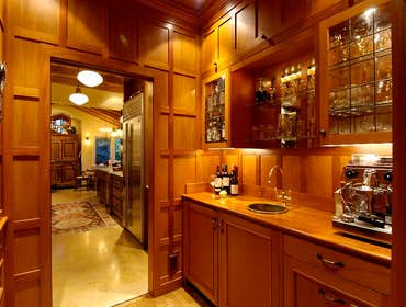 Butler's Pantry This butler's pantry features under-counter refrigeration, wine storage, sink, and an expresso machine--everything you need to make gu