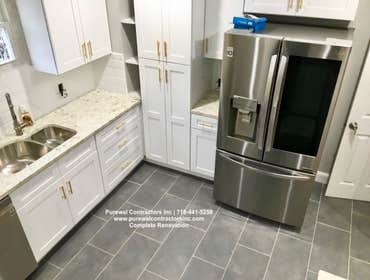 Ozane Park Kitchen Remodel The primary bathroom boasts a dual shower and tub combo, a shower with accent wall tile as a feature wall and then beautifu