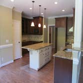 Harris Remodel by Jarman Homes Interior remodel of Dining Room, Kitchen, Family Room, Master Bath & Closets, Laundry Room, Powder Room, Stairway & balc