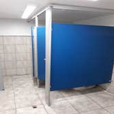 Photos by Weise Choice Construction #2 Complete remodel of industrial bathroom. Complete with floor plan change. Bathrooms were tiled and frp'd, and to