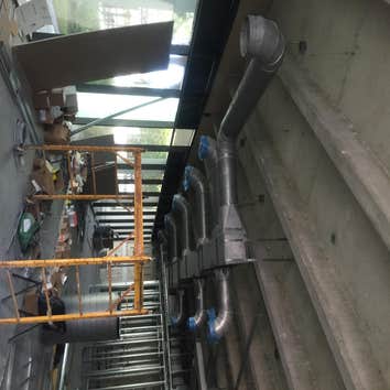 Art gallery on hollywood Blvd Metal ductwork and VAV units installation along with IView controls from Carrier.