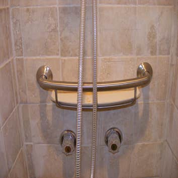 Retile Shower / new fixtures.