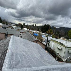 Photos by Excellencia Construction Inc #1 emergency cover a roof leak