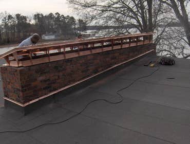 Applied Roofing Technology / Projects Copper Roofs, chimney caps & conductor head.