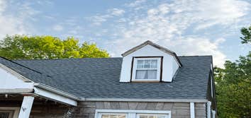 Photos by Arce Construction LLC #2 New roof and new siding with insulation walls and new trim around the windows pvc white