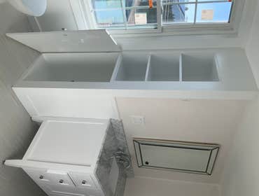Photos by Jc General Contracting & Cleaning, Inc New Bathroom build, heated flooring, smart Toto toilet, custom shower with marble accents, wallpaper, 