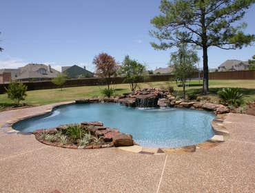 Fay Luxury Swimming Pool Design Project Wow, fire and water together in the same custom designed swimming pool environment! A gas fire ring has been 