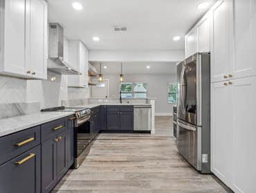 Photos by Nextden Construction #1 Full interior and exterior remodel.