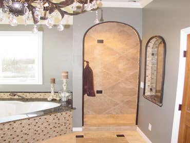 Satterly Project Complete bathroom remodel -- replaced cabinets, put in new tile to replace carpet, installed new four-jet shower, copper-clad sinks an