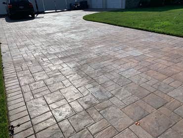 Photos by Stamped Concrete Denver LLC #1 Stamped concrete, often called textured or imprinted concrete, replicates the look of many different stones su