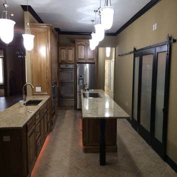 Okc Remodel Beautiful kitchen remodel with custom Barn door on pantry. bathroom remodel in edmond