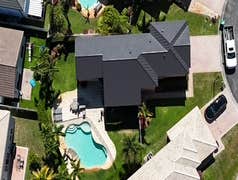 Photos by Gold Star Miami Corp #1 metal roof panels all are . 25 years warrantee