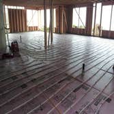 Photo(s) from Radiant Floor Heating Specialist Commercial boiler room with Lochinvar boilers and piping, Trucking companies Clean Burn waste oil burnin