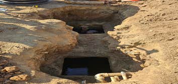 Photos by Bdp Services, Inc #1 Locate septic tank, expose lids to have the tank pumped. After pumping it was discovered that the septic divider wall ne