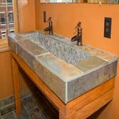 Stephen M Daniel Jr Construction Project 1 Custom built and designed bathroom sink, Adjacent shower, and Kitchen. These were all done in a 100 + yr old