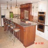 Home Addition and and Kitchen Renovation The following is a home addition and interior kitchen remodel. The interior of the kitchen was designed and in