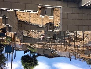 Mount Washinton Hillside land development including caissons/piles, grade beams, CMU block walls, retaining walls. All known as foundation and structur