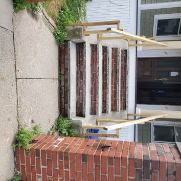 Photos by Triple Infinity LLC #1 The brick stairs were not original to the home and needed some replacing, since they did not match the new deck that w